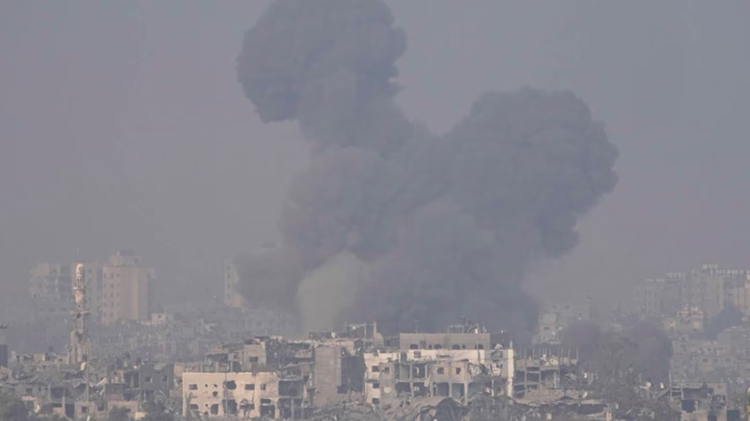 Smoke rises following an Israeli airstrike in the Gaza Strip, as seen from southern Israel. Photo / AP