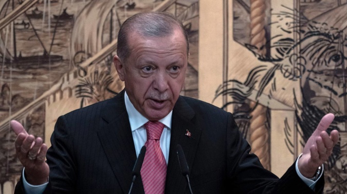 President Recep Tayyip Erdogan has watched as his currency has been decimated, plummeting by 44 per cent last year and falling another 26 per cent this year. Photo / Khalil Hamra, AP