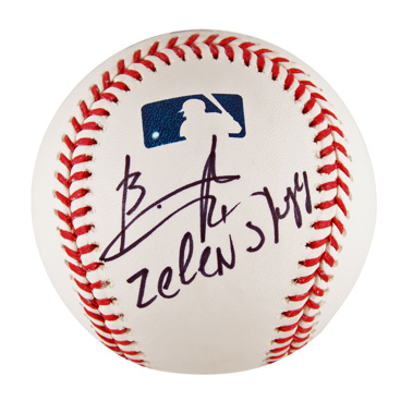 A baseball signed by Ukrainian President Volodymyr Zelenskyy. (Photo / AP)
