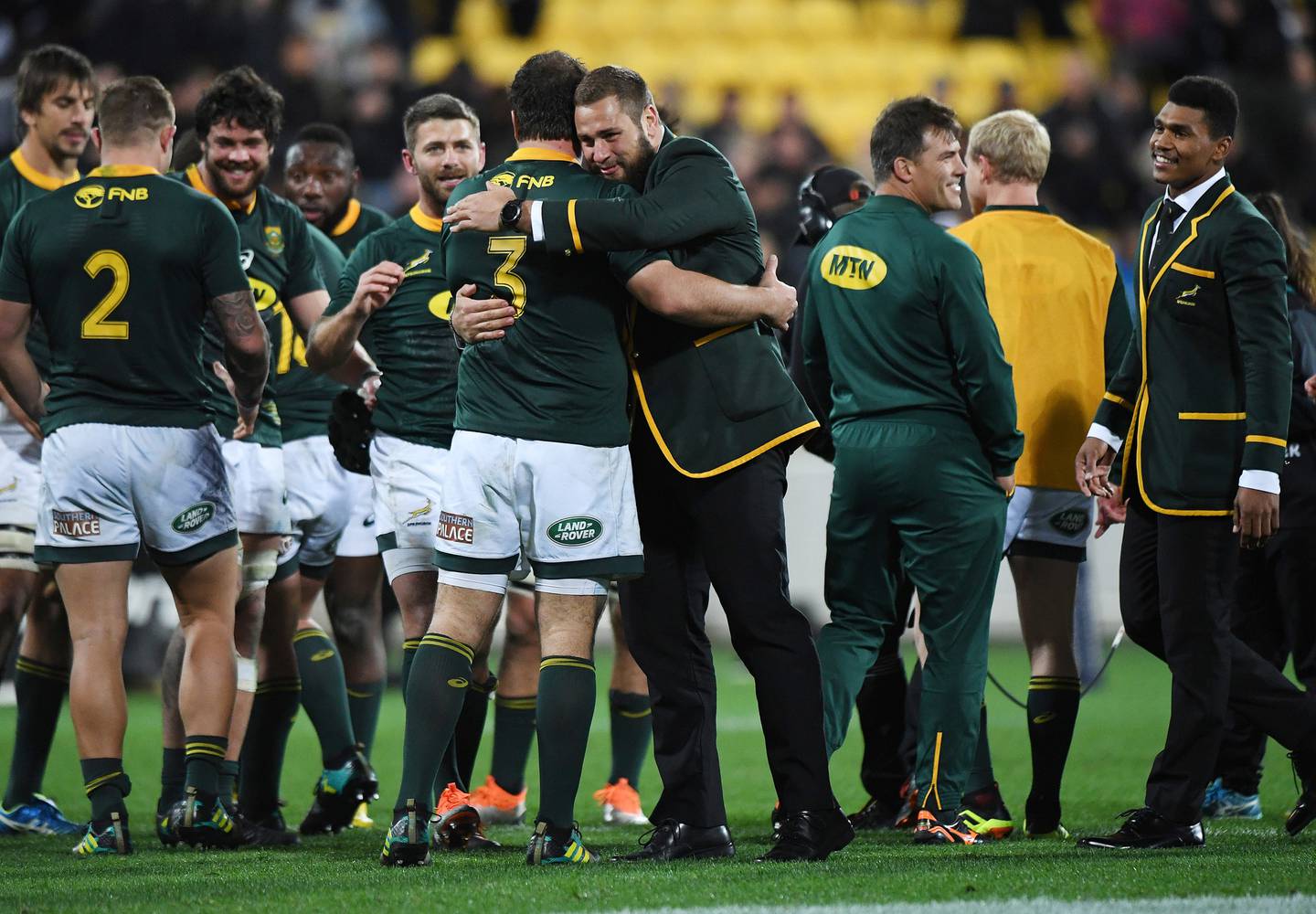 South Africa players embrace after beating the All Blacks in Wellington. Photo / Photosport