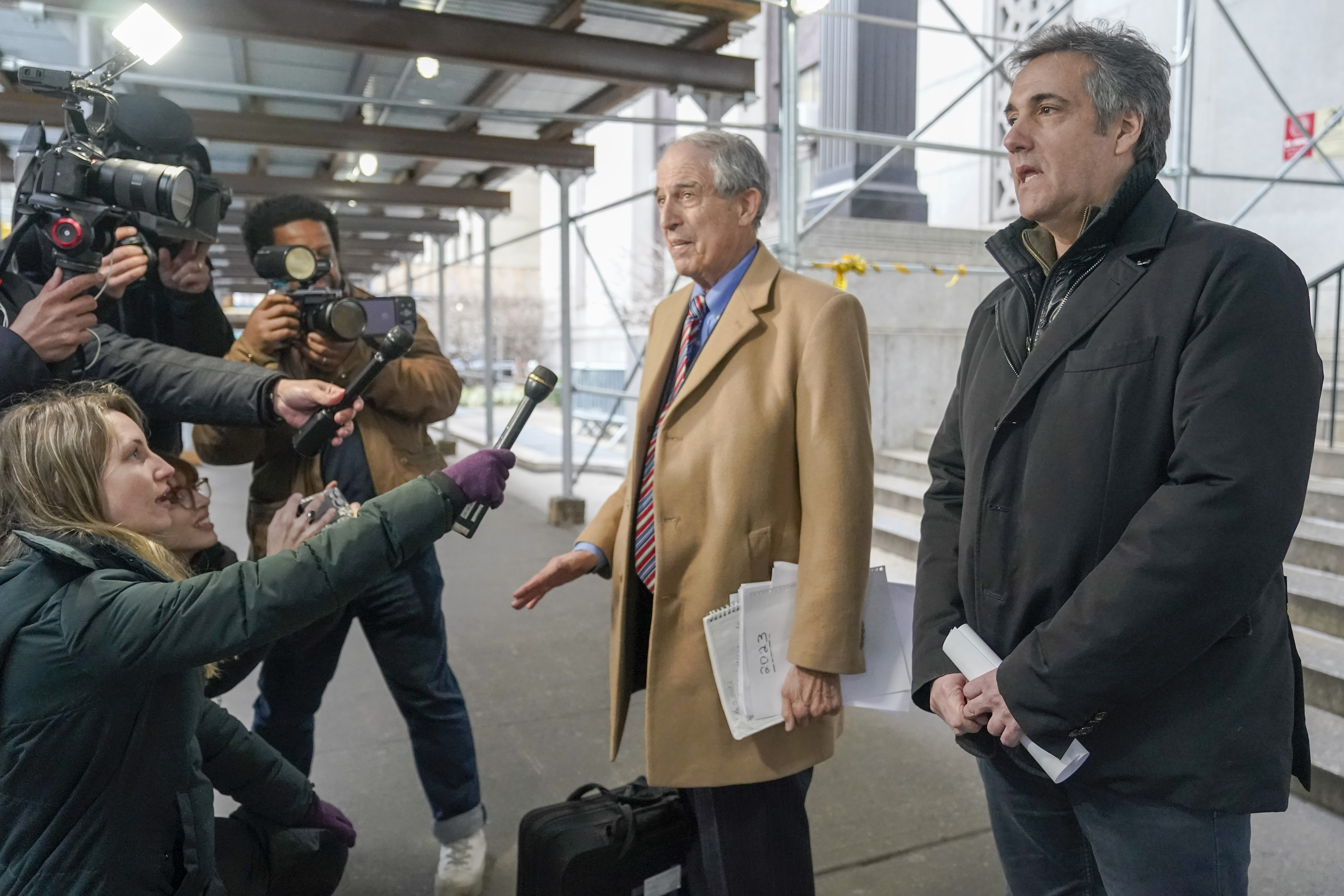 Michael Cohen, right, and his attorney Lanny Davis speak to reporters after meeting with Manhattan prosecutors, Friday, March 10, 2023, in New York.  Photo / AP
