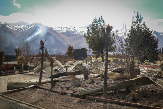 Fire damaged properties in Lake Ohau village after an out of control scrub fire took hold on the shoreline of Lake Ohau. (Photo / NZME)