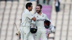 New Zealand's captain Kane Williamson, right, and Ross Taylor celebrate their win on the sixth day of the World Test Championship final. (Photo / AP)