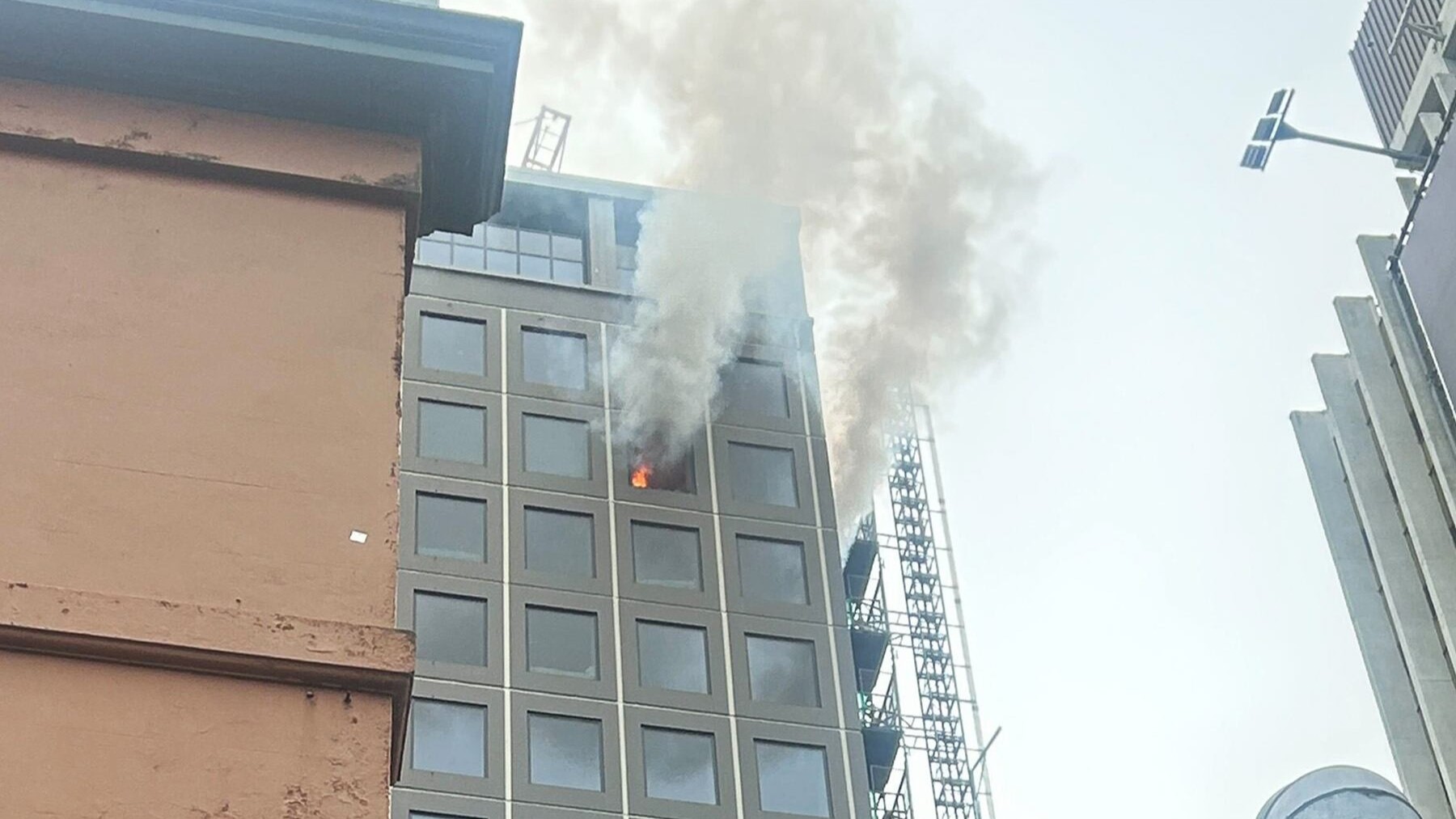 Fire erupts at central Auckland high-rise hotel