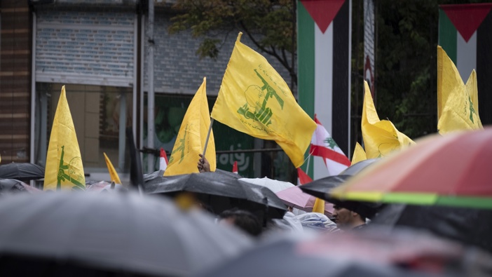 Iranian protesters wave Lebanon's Hezbollah flags during a protest gathering to condemn an Israeli air strike against Hezbollah's headquarters in the suburb of Beirut and the killing of Lebanon's Hezbollah Secretary General, Hassan Nasrallah, in Tehran, Iran, on September 28, 2024. Photo / Morteza Nikoubazl/NurPhoto via Getty Images