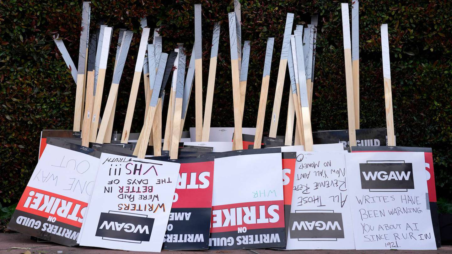 Placards are gathered together at the close of a picket by members of The Writers' Guild of America outside Walt Disney Studios. Photo / AP