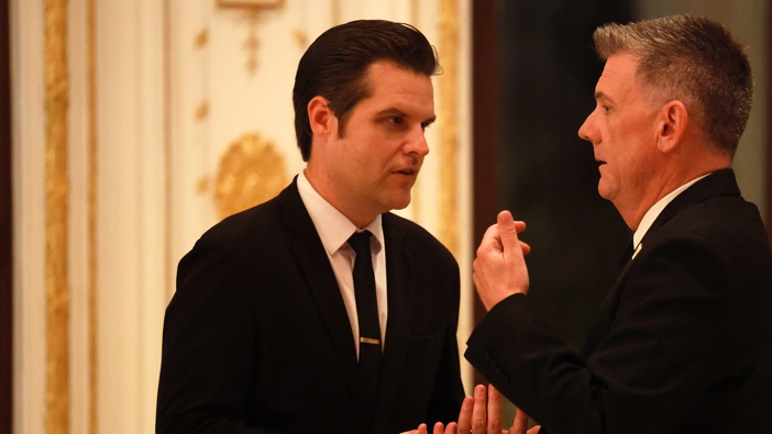 Former U.S. Rep. Matt Gaetz talks with another guest at the America First Policy Institute Gala. (Photo by Joe Raedle/Getty Images)