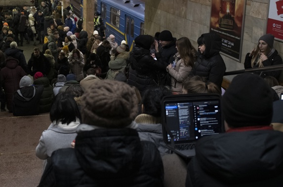 People rest in the subway station being used as a bomb shelter during a rocket attack in Kyiv, Ukraine, Monday, Dec. 5, 2022. Photo / AP