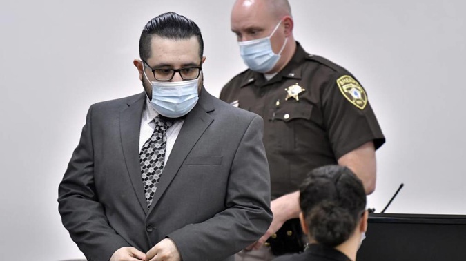 Armando Barron arrives in a courtroom on the first day of his trial. Photo / AP