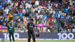 Rachin Ravindra celebrates his century against Pakistan. Photo / AP