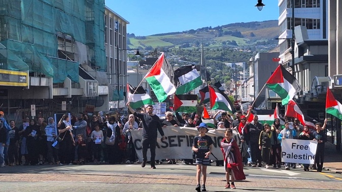 Hundreds of protestors gathered in Dunedin to call for a ceasefire in Palestine. Photo / Ben Tomsett