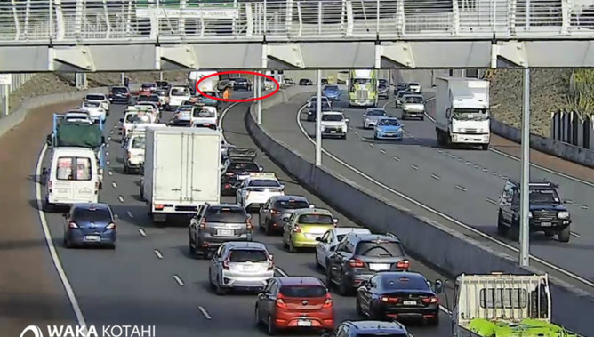 A crash on State Highway 20 is blocking the right northbound lane near the Waterview Tunnel in Auckland. Photo / Supplied