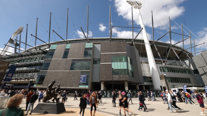 Spectators arrive ahead of the AFL Grand Final match between Geelong Cats and Brisbane Lions at Melbourne Cricket Ground on September 27, 2025 in Melbourne, Australia. (Photo by Robert Cianflone/AFL Photos/via Getty Images)