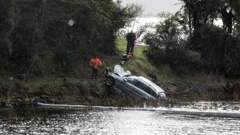 Auckland father David Jarden's Mercedes-Benz was recovered from Lake Rotomā on July 12, 2020 – the day after the fatal crash. Photo / Andrew Warner