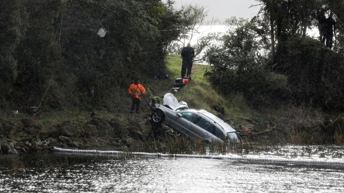 Auckland father David Jarden's Mercedes-Benz was recovered from Lake Rotomā on July 12, 2020 – the day after the fatal crash. Photo / Andrew Warner