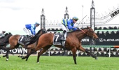 Point Barrow ridden by Daniel Stackhouse wins the Crown Red Roses Stakes at Flemington Racecourse on November 06, 2025 in Flemington, Australia. (Photo by Brett Holburt/Racing Photos via Getty Images)
