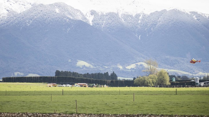 Emergency services have rushed to a Staveley, Mid Canterbury farm after reports of someone being trapped in machinery. Photo / George Heard