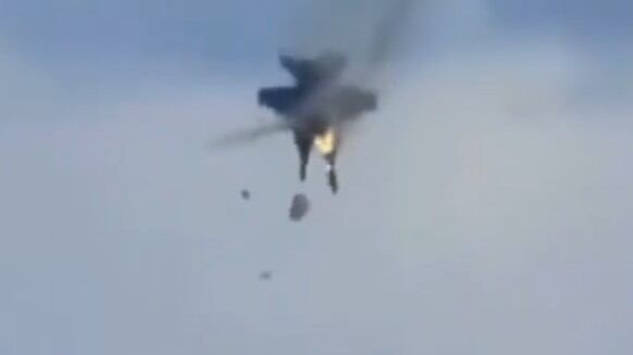 Midair collision above Idaho airshow destroys two fighter jets but crews eject safely
