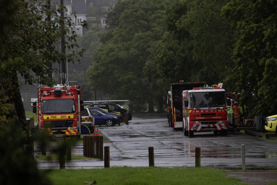 Police and other emergency services responded to a call where a landslide had brought down a house on Shore Road, Remuera last night. Photo / Hayden Woodward