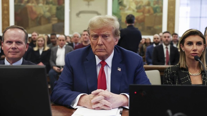 Former US president Donald Trump, with lawyers Christopher Kise and Alina Habba, during the closing arguments in the Trump Organisation civil fraud trial at New York Supreme Court. Photo / AP