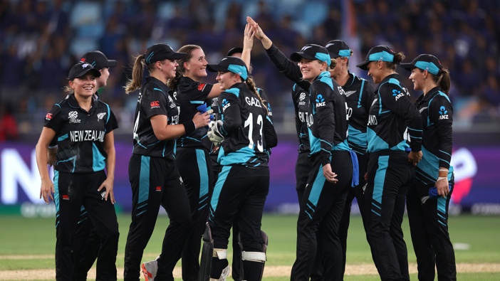 Rosemary Mair of New Zealand celebrates taking the wicket of Harmanpreet Kaur of India with teammates during the ICC Women's T20 World Cup 2024 match between India and New Zealand at Dubai International Stadium on October 04, 2024 in Dubai, United Arab Emirates. (Photo by Alex Davidson-ICC/ICC via Getty Images)