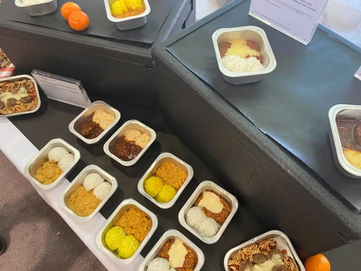 Lunches that will be served as part of the school lunch programme on display. Photo / Julia Gabel