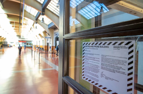 An earthquake-prone building sign in Wellington railway station. (Photo / Mark Mitchell)