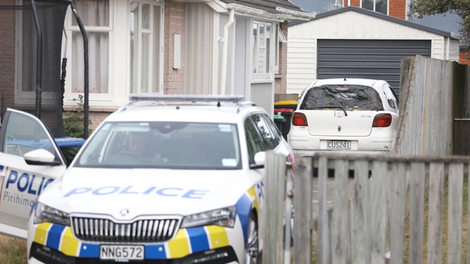 Police raided two properties connected to the stabbing on Wednesday afternoon. Photo / George Heard