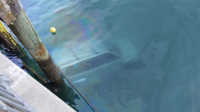 The woman's submerged 4WD vehicle pictured below the surface after she crashed into the water off Matiatia Ferry Terminal on Waiheke Island.
