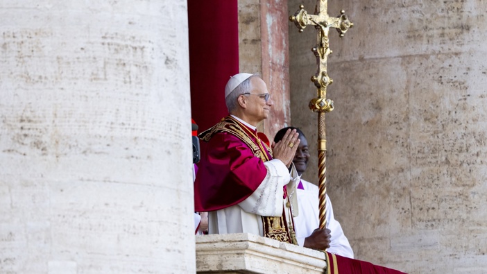 Newly elected Pope Leo XIV, Robert Francis Prevost is seen for the first time from the Vatican balcony on May 8, 2025 in Vatican City, Vatican. White smoke was seen over the Vatican early this evening as the Conclave of Cardinals took just two days to elect Cardinal Robert Francis Prevost, who will be known as Pope Leo (Leone) XIV, as the 267th Supreme Pontiff after the death of Pope Francis on Easter Monday. (Photo by Marco Mantovani/Getty Images)