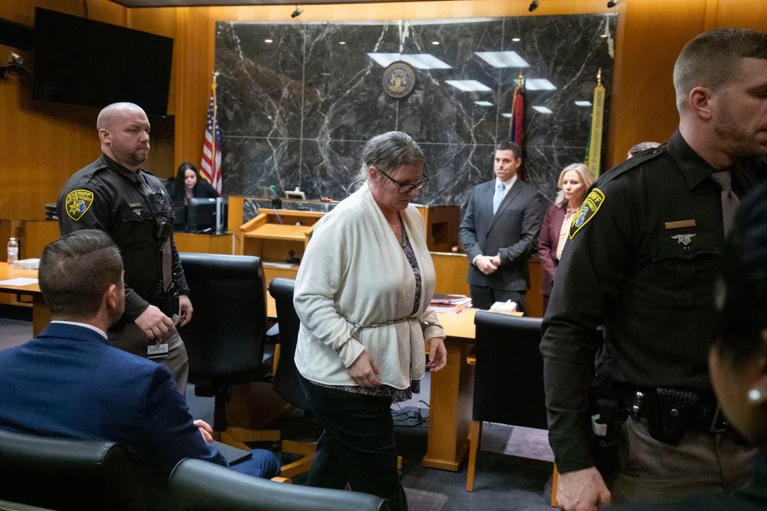 Jennifer Crumbley exits from the courtroom in shackles on Tuesday after her guilty verdict. Bill Pugliano/Getty Images