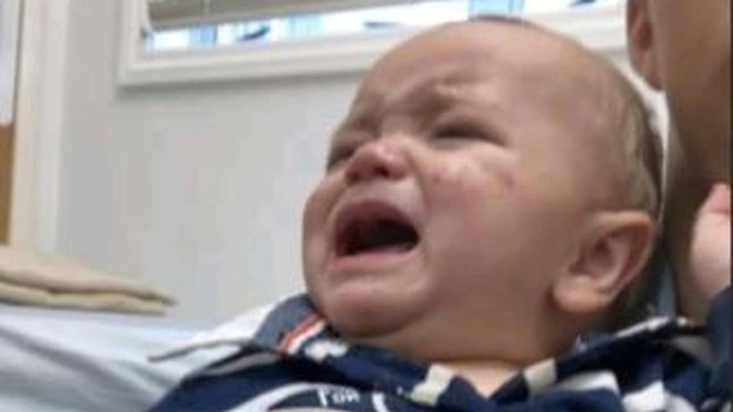 Baby Kairo and mum Gabi Brooks waited on the floor. Photo / Supplied