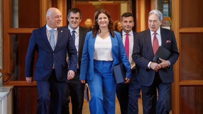 Finance Minister Nicola Willis with, from left, Christopher Luxon, Chris Bishop, David Seymour and Winston Peters, on the way to the House. Photo / Mark Mitchell