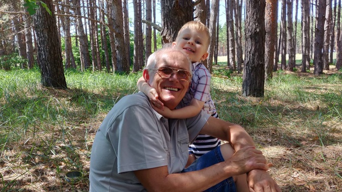 Leonid Yurasov, pictured with his grandson Elijah Ului in Nova Kakhovka, Ukraine. Photo / Supplied