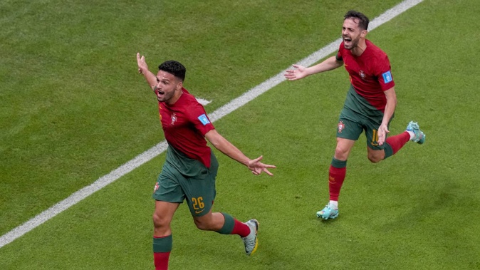 Portugal's Goncalo Ramos, left, celebrates scoring the opening goal against Switzerland. Photo / AP