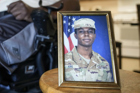 A portrait of American soldier Travis King is displayed as his grandfather, Carl Gates, talks about his grandson on July 19, 2023. Photo / AP
