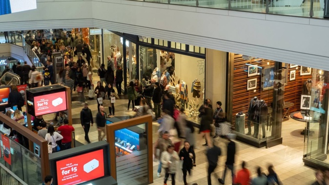 Nearly half of New Zealanders are planning to cut back on their spending this Christmas. Photo / 123RF