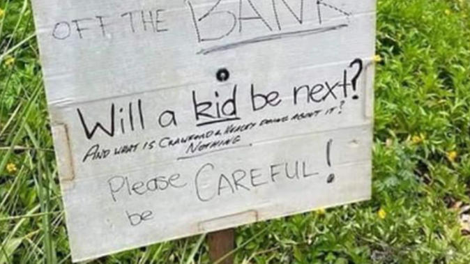 The family posted a sign at the site to warn others. Photo / Facebook