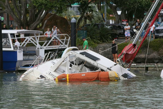 Numerous boats have been sunk or destroyed by last night's huge surge at Tutukaka, Northland marina. Photo / Tania Whyte