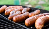 Butchers battle it out to see who stuffs the quintessential sausage and who snags the win. Photo / 123RF