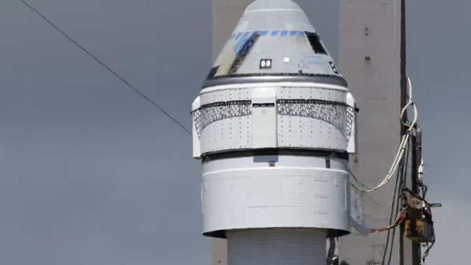 Boeing's Starliner capsule atop an Atlas V rocket is rolled out to the launch pad at Space Launch Complex 41. Photo / AP