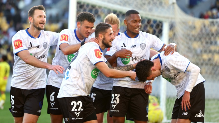 Auckland FC celebrate a goal scored by Jake Brimmer during the round three A-League Men match between Wellington Phoenix and Auckland FC at Sky Stadium, on November 02, 2024, in Wellington, New Zealand. (Photo by Phil Walter/Getty Images)