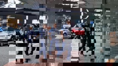 Police arrive to restore order at the Napier courthouse. Photo / Ric Stevens