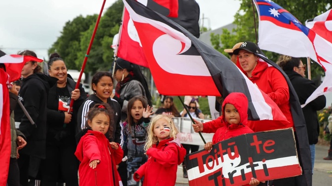 Toitū te Tiriti ... mokopuna at the fore to welcome the hīkoi. Photo / Nicola Stubbs