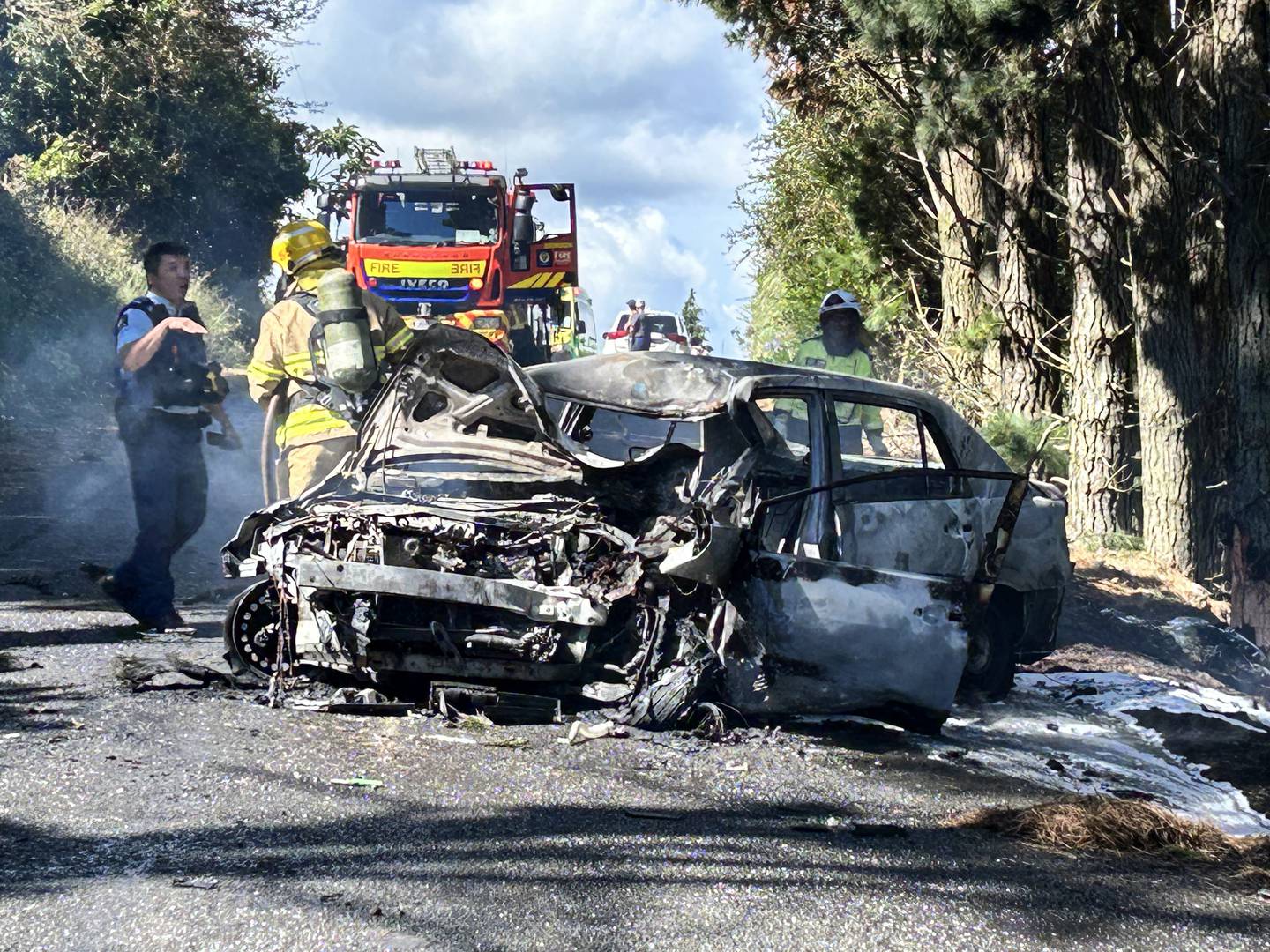 What was left of the car after it caught fire in Puni, near Pukekohe. Photo / Auckland Rescue Helicopter Trust