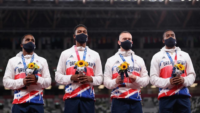 4x100m relay silver medal winners Chijindu Ujah, Zharnel Hughes, Richard Kilty and Nethaneel Mitchell-Blake of Team Great Britain. (Photo / Getty)