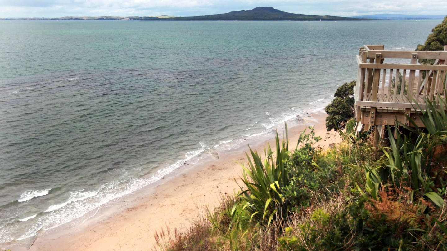 Police said the woman was stuck on the rocks at Castor Bay. Photo / Doug Sherring