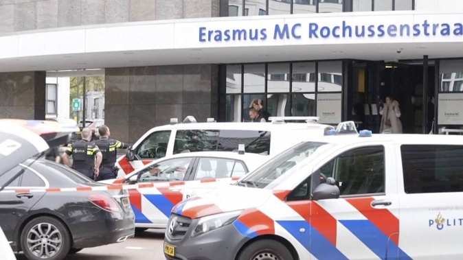 Emergency services attend to the scene at Erasmus Medical Center in Rotterdam, the Netherlands following a shooting which left two people dead. (Photo / AP)